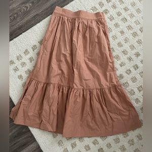 Peach colored tiered maxi skirt